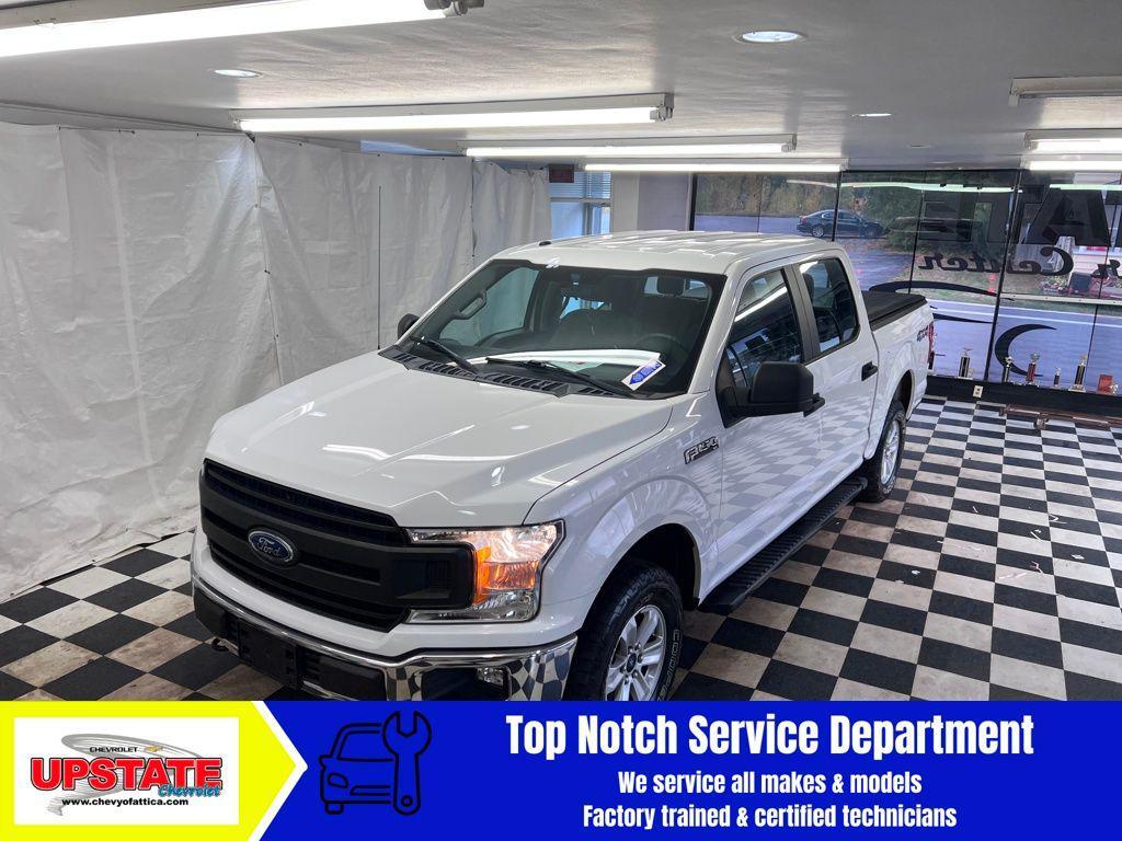 used 2018 Ford F-150 car, priced at $25,061