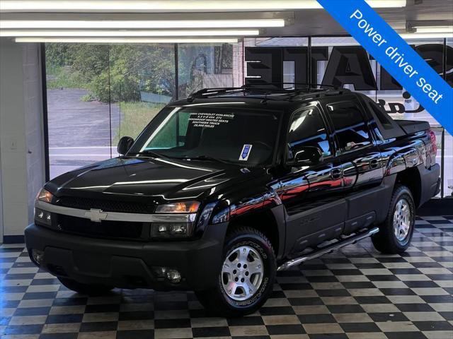 used 2004 Chevrolet Avalanche car, priced at $39,989