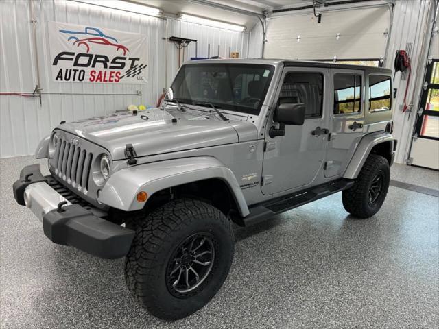 used 2014 Jeep Wrangler Unlimited car, priced at $18,995