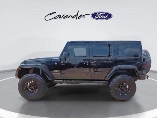 used 2014 Jeep Wrangler Unlimited car, priced at $19,491