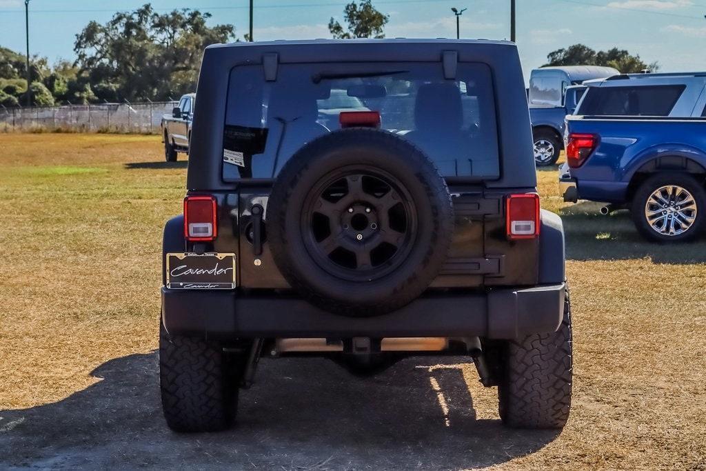 used 2014 Jeep Wrangler Unlimited car, priced at $18,347