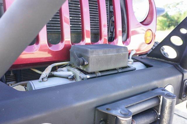 used 2013 Jeep Wrangler Unlimited car, priced at $18,449