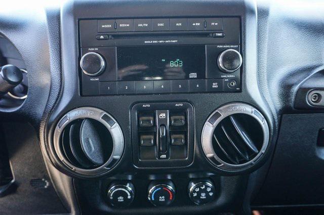 used 2013 Jeep Wrangler Unlimited car, priced at $18,449