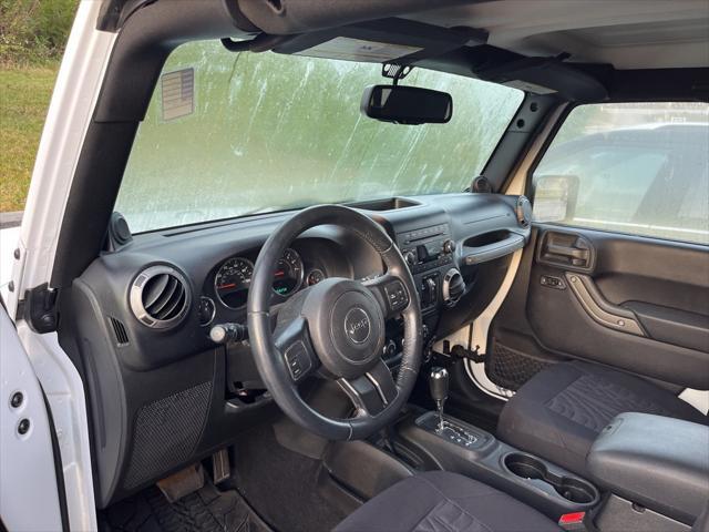 used 2013 Jeep Wrangler Unlimited car, priced at $14,163