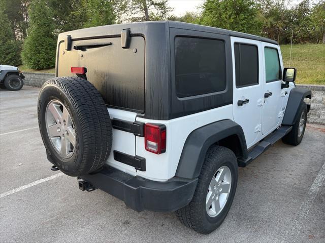 used 2013 Jeep Wrangler Unlimited car, priced at $14,163