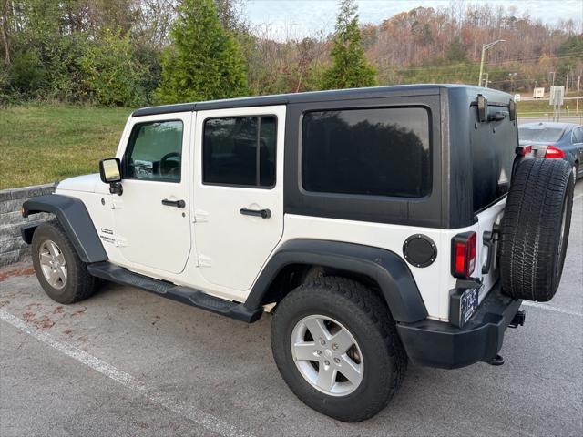 used 2013 Jeep Wrangler Unlimited car, priced at $14,163