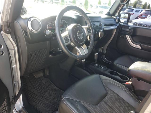 used 2013 Jeep Wrangler Unlimited car, priced at $22,525