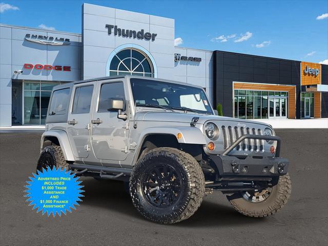 used 2013 Jeep Wrangler Unlimited car, priced at $22,525