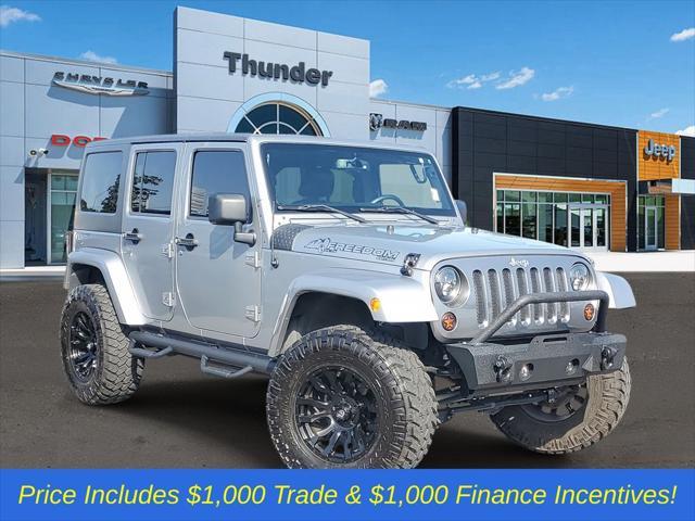 used 2013 Jeep Wrangler Unlimited car, priced at $22,525