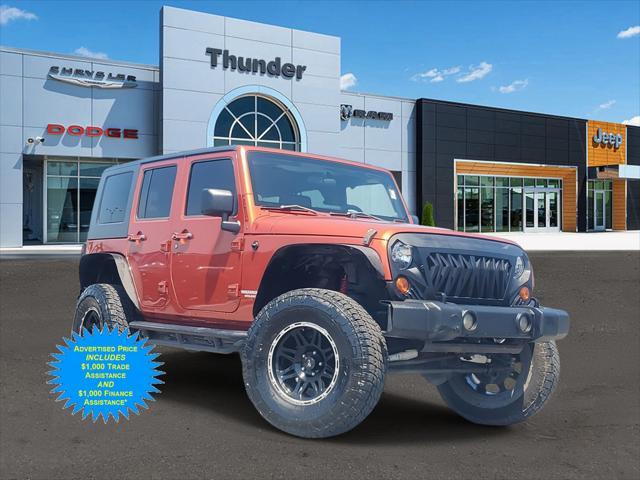 used 2009 Jeep Wrangler Unlimited car, priced at $16,250