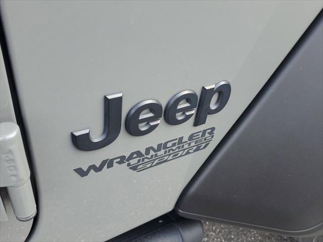 used 2021 Jeep Wrangler Unlimited car, priced at $31,899