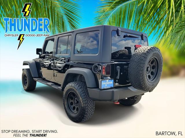 used 2011 Jeep Wrangler Unlimited car, priced at $17,656