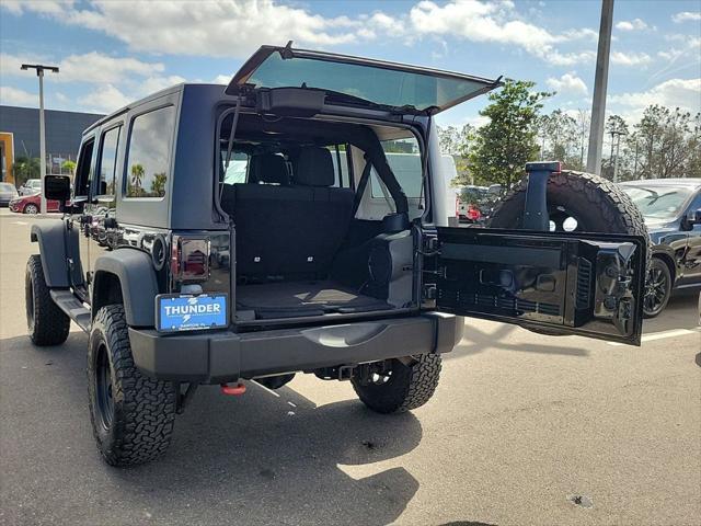 used 2011 Jeep Wrangler Unlimited car, priced at $17,656