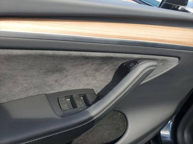 used 2024 Tesla Model Y car, priced at $36,546