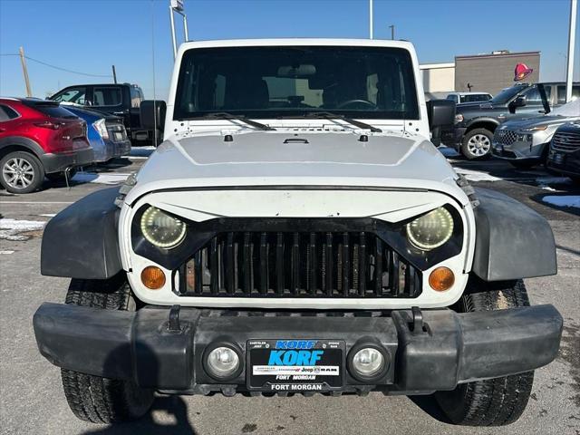 used 2012 Jeep Wrangler Unlimited car, priced at $9,990