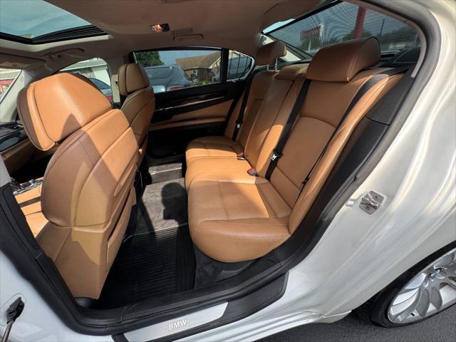 used 2012 BMW 750 car, priced at $9,990