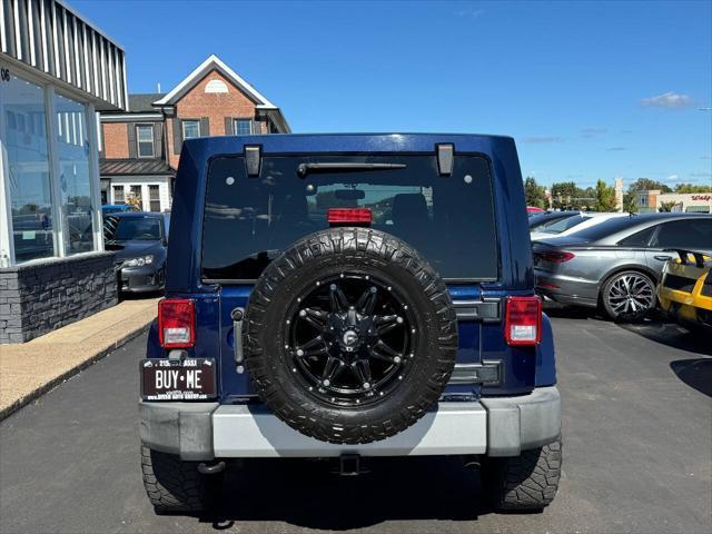 used 2013 Jeep Wrangler Unlimited car, priced at $18,990