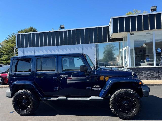 used 2013 Jeep Wrangler Unlimited car, priced at $18,990