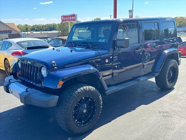 used 2013 Jeep Wrangler Unlimited car, priced at $18,990