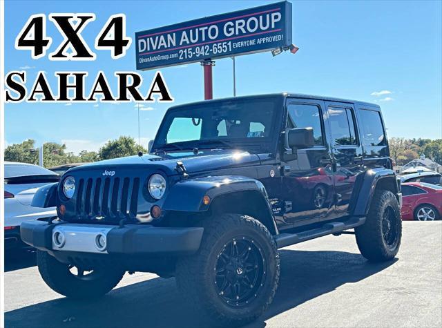 used 2013 Jeep Wrangler Unlimited car, priced at $18,990