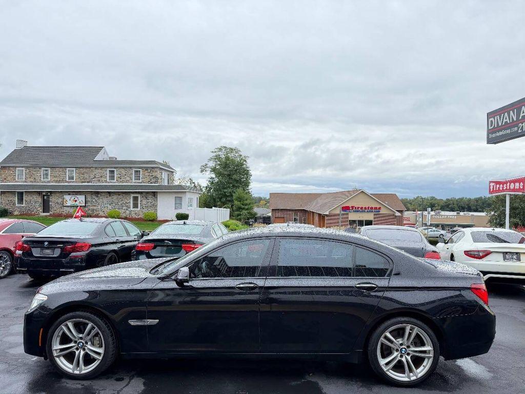 used 2014 BMW 740 car, priced at $13,990