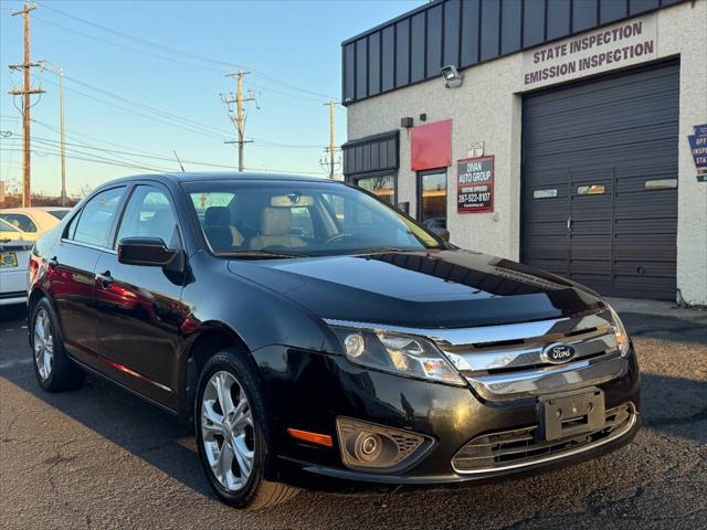 used 2012 Ford Fusion car, priced at $6,990