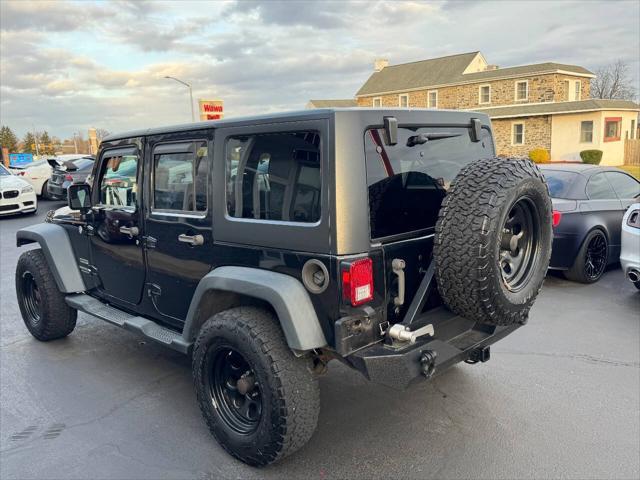 used 2013 Jeep Wrangler Unlimited car, priced at $13,990