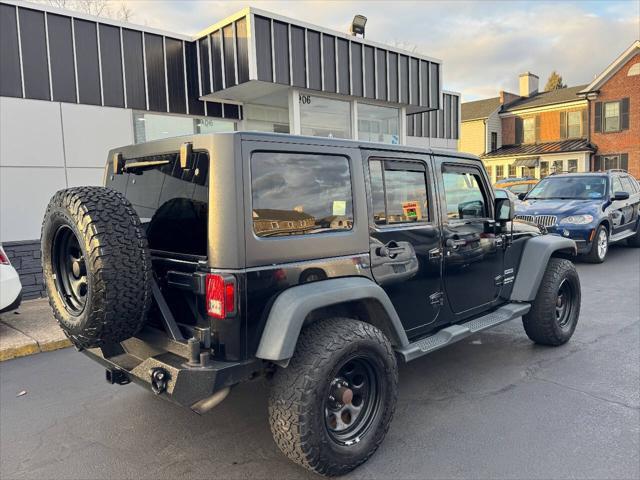 used 2013 Jeep Wrangler Unlimited car, priced at $13,990