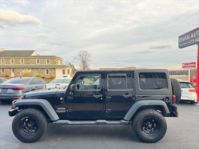 used 2013 Jeep Wrangler Unlimited car, priced at $13,990