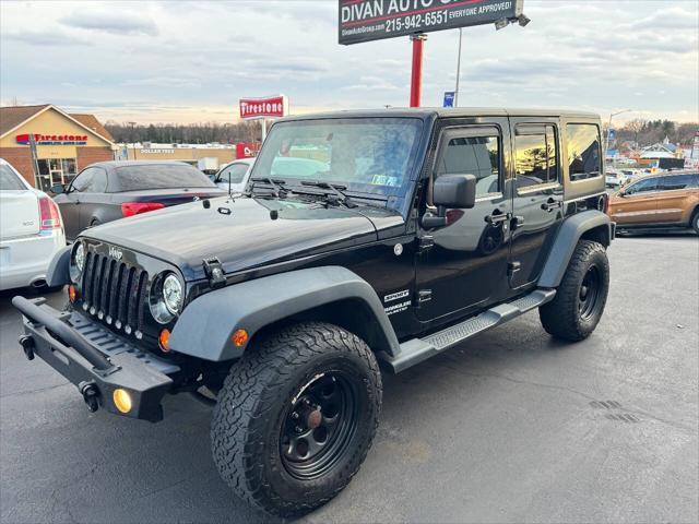 used 2013 Jeep Wrangler Unlimited car, priced at $13,990