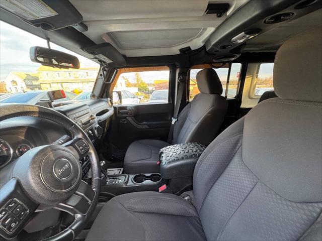 used 2013 Jeep Wrangler Unlimited car, priced at $13,990