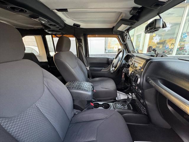 used 2013 Jeep Wrangler Unlimited car, priced at $13,990