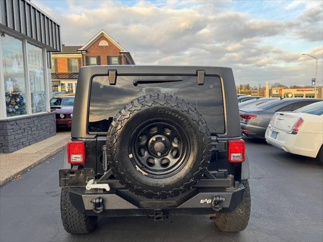 used 2013 Jeep Wrangler Unlimited car, priced at $13,990