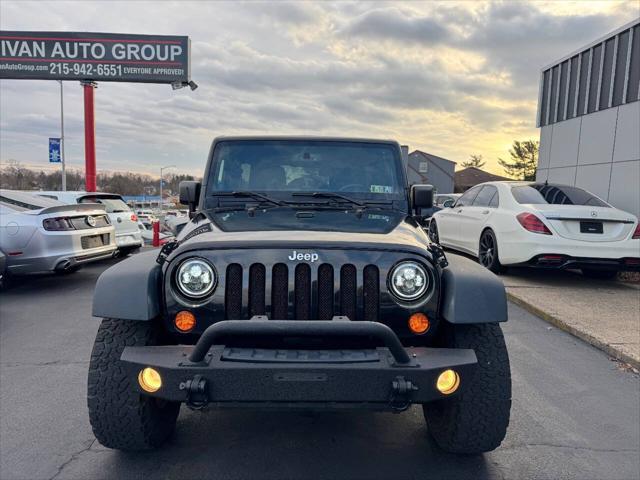 used 2013 Jeep Wrangler Unlimited car, priced at $13,990