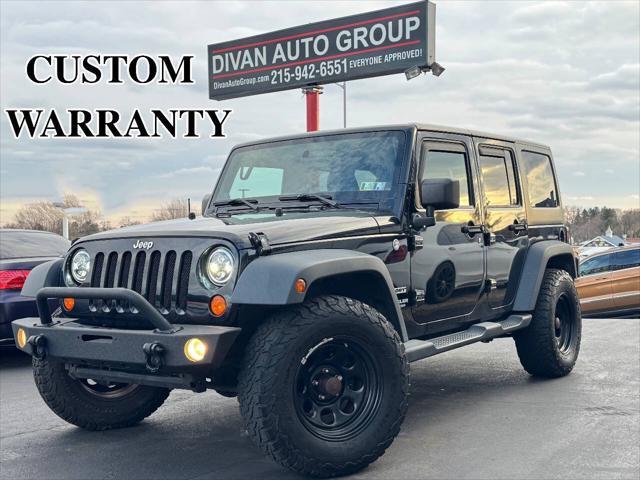 used 2013 Jeep Wrangler Unlimited car, priced at $13,990