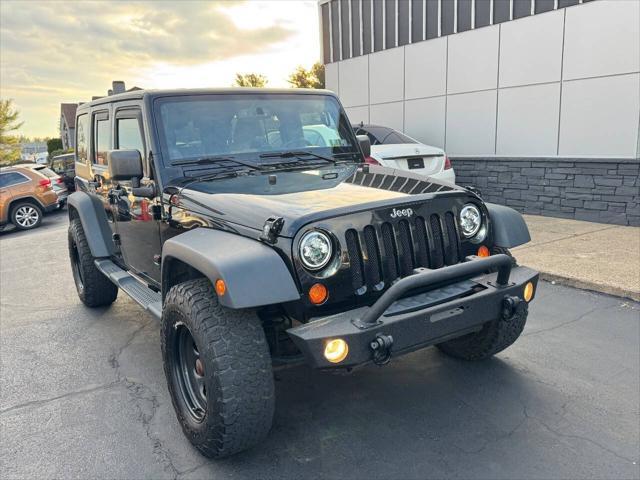 used 2013 Jeep Wrangler Unlimited car, priced at $13,990