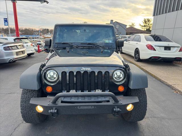 used 2013 Jeep Wrangler Unlimited car, priced at $13,990