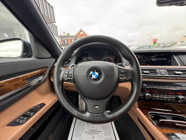 used 2015 BMW 750 car, priced at $18,990