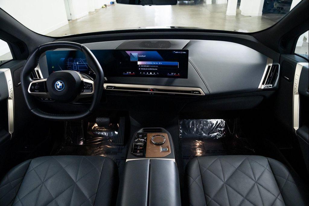 used 2024 BMW iX car, priced at $55,990