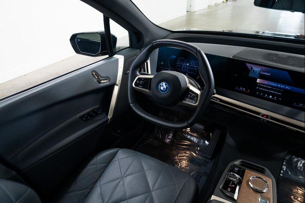 used 2024 BMW iX car, priced at $55,990