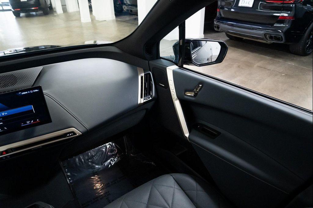 used 2024 BMW iX car, priced at $55,990