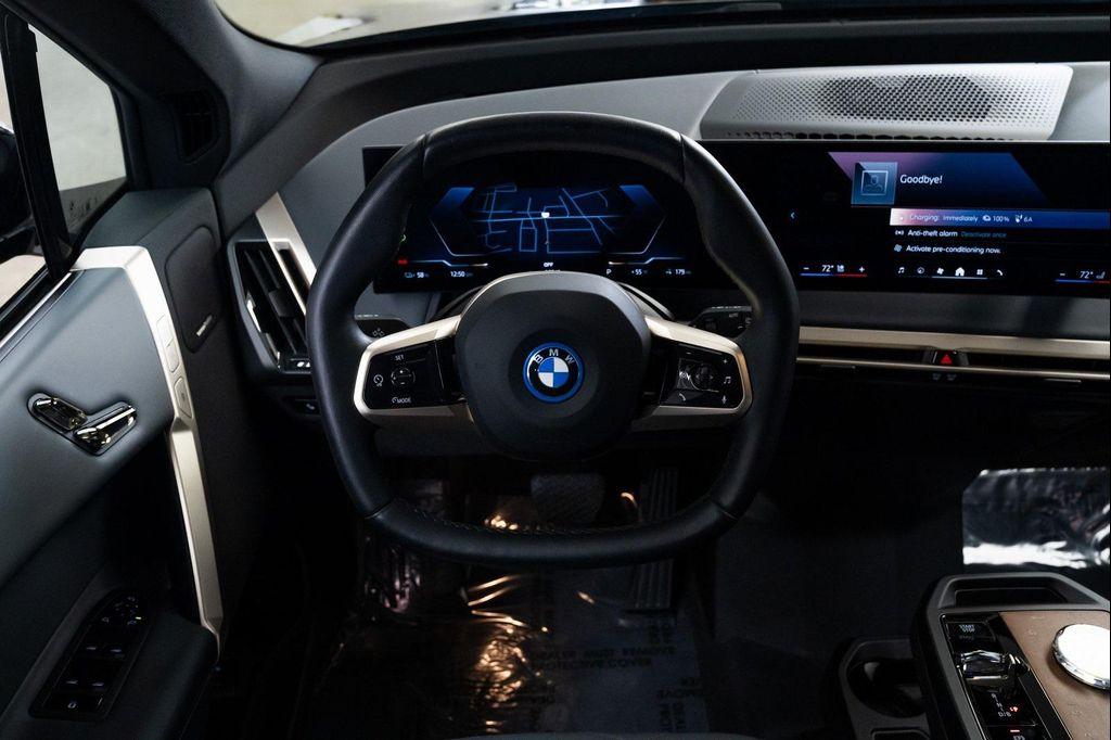 used 2024 BMW iX car, priced at $55,990