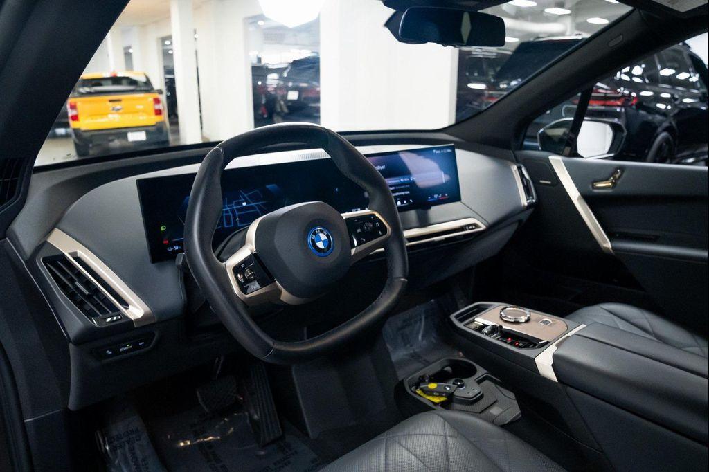 used 2024 BMW iX car, priced at $55,990