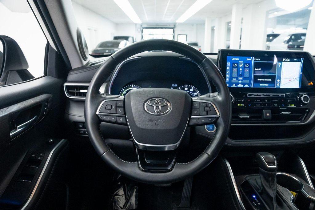 used 2021 Toyota Highlander Hybrid car, priced at $38,790
