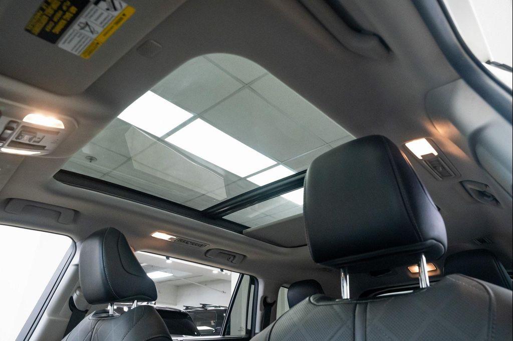 used 2021 Toyota Highlander Hybrid car, priced at $38,790