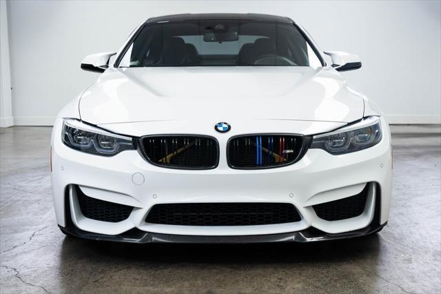 used 2020 BMW M4 car, priced at $64,490