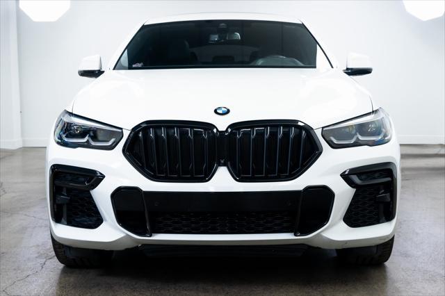 used 2022 BMW X6 car, priced at $56,090