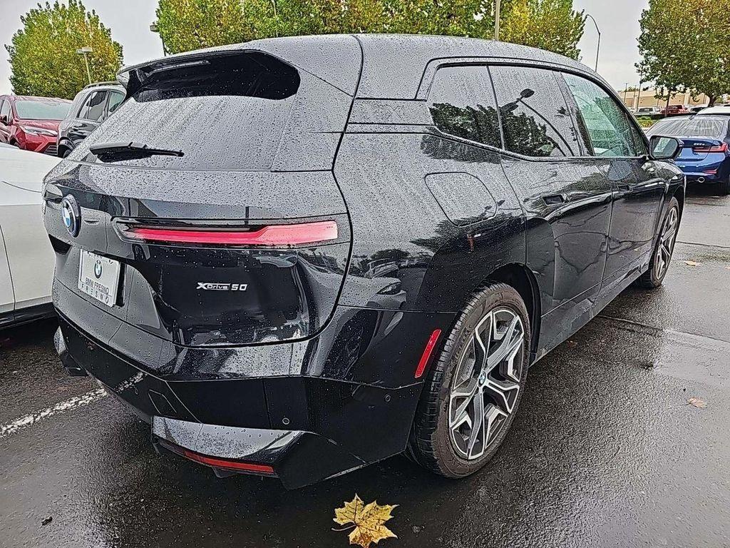 used 2024 BMW iX car, priced at $57,990