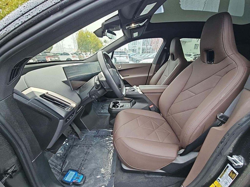 used 2024 BMW iX car, priced at $57,990