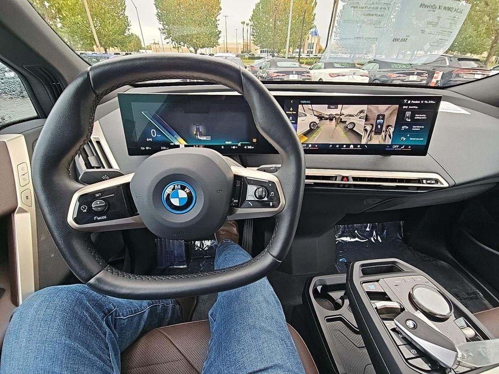 used 2024 BMW iX car, priced at $57,990